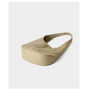 Detailed view of minimalist leather underarm bag showcasing fine stitching and texture.
