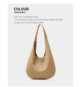 Detailed view of minimalist leather hobo shoulder bag, premium texture and large capacity.