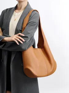 Premium genuine leather hobo shoulder bag for women, stylish large capacity commuter tote.