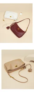 Genuine leather hobo shoulder bag with turn-lock closure and elegant minimalist commuter style.