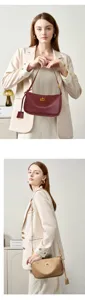 Genuine leather underarm bag for women, elegant shoulder bag with metal lock.