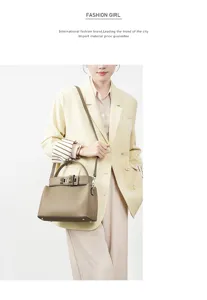 Elegant leather commuter shoulder bag with top handle and stylish turn-lock closure.