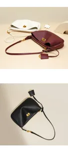 Elegant genuine leather underarm shoulder bag with chic square lock and gold hardware.