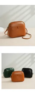 Detail view of genuine leather cowhide crossbody bag, showing texture and multiple color options.
