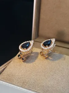 Orecchini a lobo in zircone con pietra nera a goccia, eleganti gioielli moda color oro raffinati.