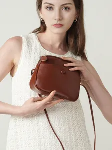 Brown leather crossbody shoulder bag for women, casual minimalist daily commuter handbag.