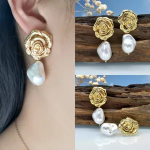 Dettagli in primo piano di orecchini con rosa dorata e perla barocca, stile retrò elegante.