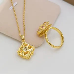 Elegante set collana e anello moda, gioielli con design floreale zircone girevole.