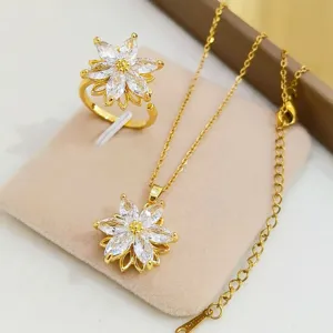 Set collana e anello con fiore rotante placcato in oro con brillanti cristalli di zirconia.