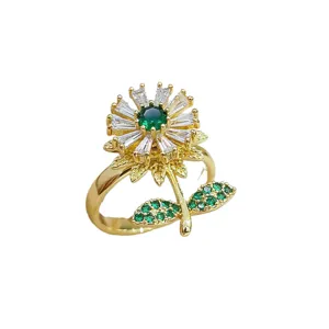 Anello fiore rotante placcato in oro con pavè di zirconia verde e bianco per donna