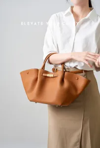 Elegant brown leather tote bag for women, large capacity stylish commute shoulder bag.