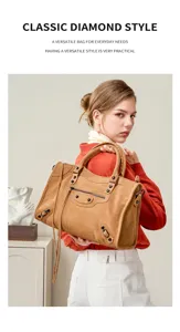 Stylish suede motorcycle handbag for women, versatile shoulder bag for daily casual use.