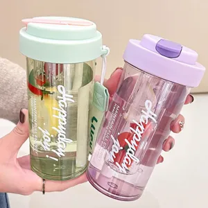 Detail shot showing infuser water bottles with straw and fruit filter in vibrant colors.