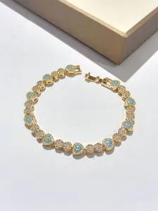 Bracciale a catena dorata con zirconi bianchi e blu scintillanti per gioielli alla moda da donna.