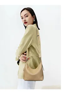 Detailed close-up view of genuine leather hobo shoulder bag, ideal for commuting.