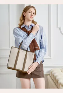 Vertical canvas tote bag for women, large capacity genuine leather shoulder handbag for commute.