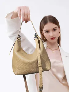 Genuine leather hobo shoulder bag for women, stylish commuting tote with adjustable strap.