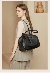Classic black genuine leather Boston bag, large capacity women shoulder bag for daily commute.