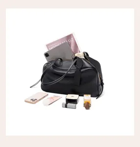 Black genuine leather Boston bag, large capacity handbag and shoulder bag for daily commute.