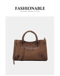 Brown suede motorcycle handbag for women, stylish vintage shoulder bag with metal studs.