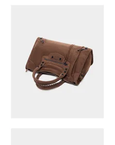 Brown suede motorcycle handbag for women, stylish shoulder tote bag with classic hardware.