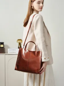 Genuine leather tote bag for women, large capacity shoulder handbag, stylish commuter purse.