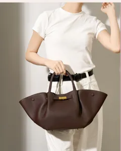 Premium genuine leather women's commute shoulder bag large capacity elegant ladies handbag.