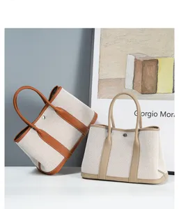 High quality canvas tote bag with top layer cowhide leather trim, large capacity bag.