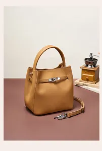 Premium leather bucket bag with top handle and strap for women elegant daily commuting use.