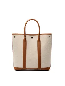 Vertical canvas tote bag with brown leather trim, large capacity shoulder handbag main image.