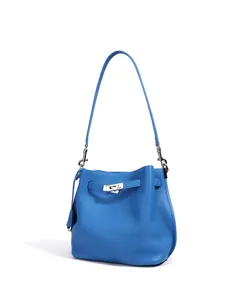 Blue pebbled leather bucket bag detail showing the metal turn-lock strap and shoulder strap.