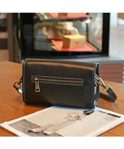 Black vintage leather shoulder bag, genuine cowhide crossbody bag with retro metal hardware.