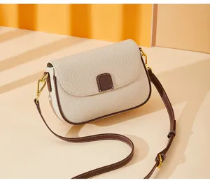 Elegant genuine leather shoulder bag for women, versatile contrast color crossbody bag for daily use.