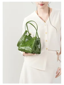 Green leather woven handbag for women, casual tote shoulder bag with large capacity and chic style.