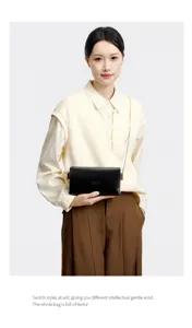 Minimalist leather chain shoulder bag for women, stylish underarm bag for daily commute.