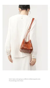 Woven leather bucket bag for women, stylish brown shoulder bag with high quality.