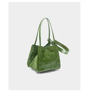 Green woven leather handbag, premium commuter shoulder bag, stylish casual tote for women.