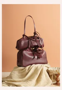Burgundy leather Boston shoulder bag, stylish large capacity women handbag for daily commute.