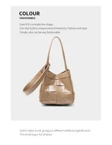 Close-up of brown woven leather handbag showcasing detailed craftsmanship and texture.