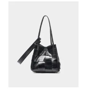 Black woven leather handbag detail, premium genuine leather shoulder bag design style.