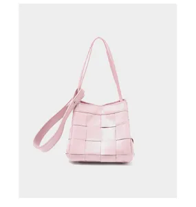 Pink woven leather bucket bag detail showing premium handcrafted texture and shoulder strap.