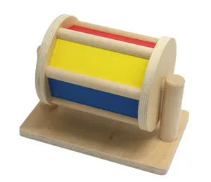 Montessori wooden spinning drum toy with colorful panels for early childhood education.