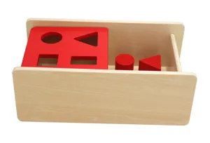 Montessori wooden shape sorting box detail, educational geometry matching toy for early learning.