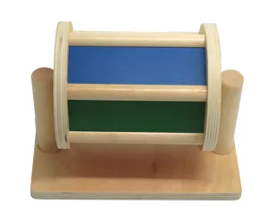 Wooden Montessori rolling drum detail shot, colorful sensory educational toy for kids learning.