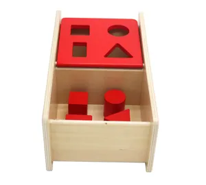 Wooden shape sorter toy detail, Montessori geometric blocks learning box for toddlers and babies.