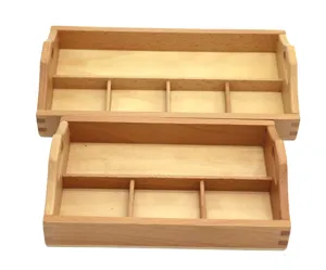 Wooden Montessori sorting trays with multiple compartments and handles for early education.