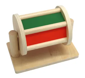 Wooden Montessori spinning drum detail showing multi-color panels for early education.