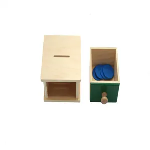 Wooden Montessori coin box detail, early educational sorting toy with drawer and blue coins.