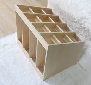 Wooden Montessori rug rack detail view, multi-layer compartmentalized organizer storage.