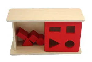 Wooden shape sorter detail view showing red geometric blocks and sorting panel for early education.
